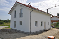 Babensham, Lkr. Rosenheim, Point 150 KfW 55 mit Erker und Balkon auf Bodenplatte